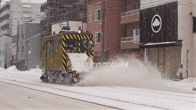 除雪中の札幌市電ササラ電車